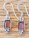 Wholesale silver earrings with wire bezel.